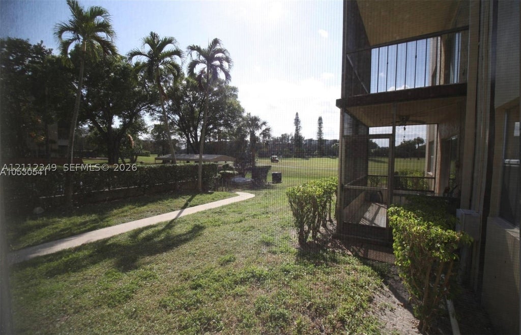 Photo of 6361 N Falls Cir Dr #109, Lauderhill, FL 33319 (MLS # A12112349)