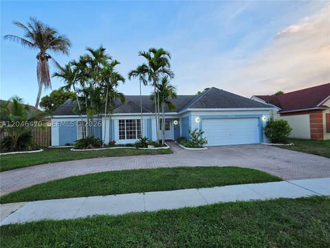 Photo of 9300 Dunhill Dr, Miramar, FL 33025 (MLS # A12046470)