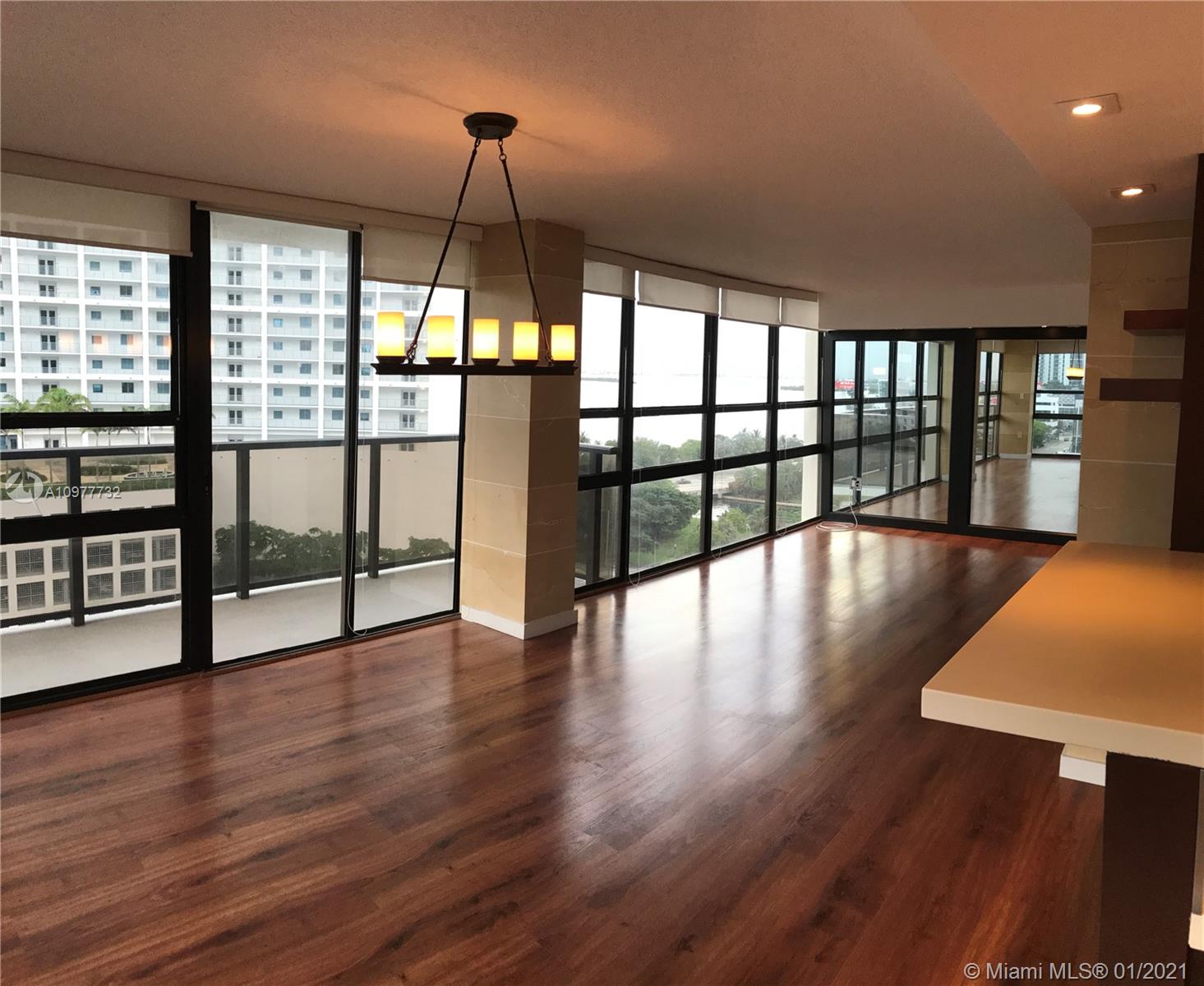 Spectacular 1BR/2BA unit in Charter Club. Centrally located in Edgewater, close to Midtown, Design District, Buena Vista, Brickell and Miami Beach. Kitchen renovated with custom cabinetry and quartz counter tops, top-of-the-line appliances. Custom cabinetry throughout and very spacious. Amazing views of the city from floor-to-ceiling glass, Biscayne Bay and Miami Beach. New HVAC, Nest thermostat, tankless water heater, stackable washer/dryer, new glass balcony. Unit comes with 2 parking spaces (one covered one assigned outside). Building has a gym, convenience market /coffee shop and hair salon.