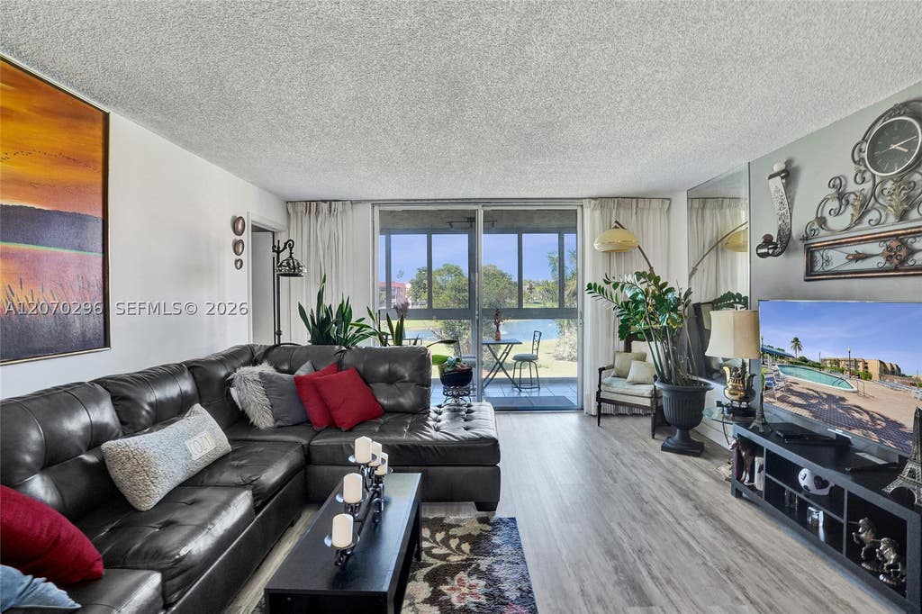 Photo of 9461 Sunrise Lakes Blvd #208, Sunrise, FL 33322 (MLS # A12070296)