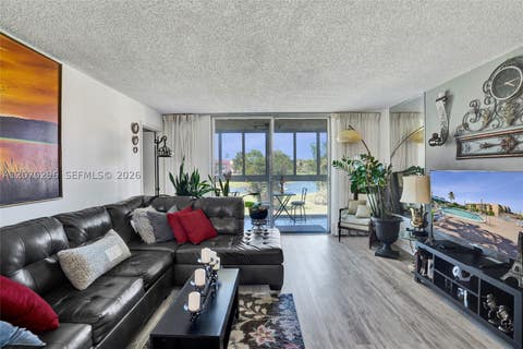 Photo of 9461 Sunrise Lakes Blvd #208, Sunrise, FL 33322 (MLS # A12070296)