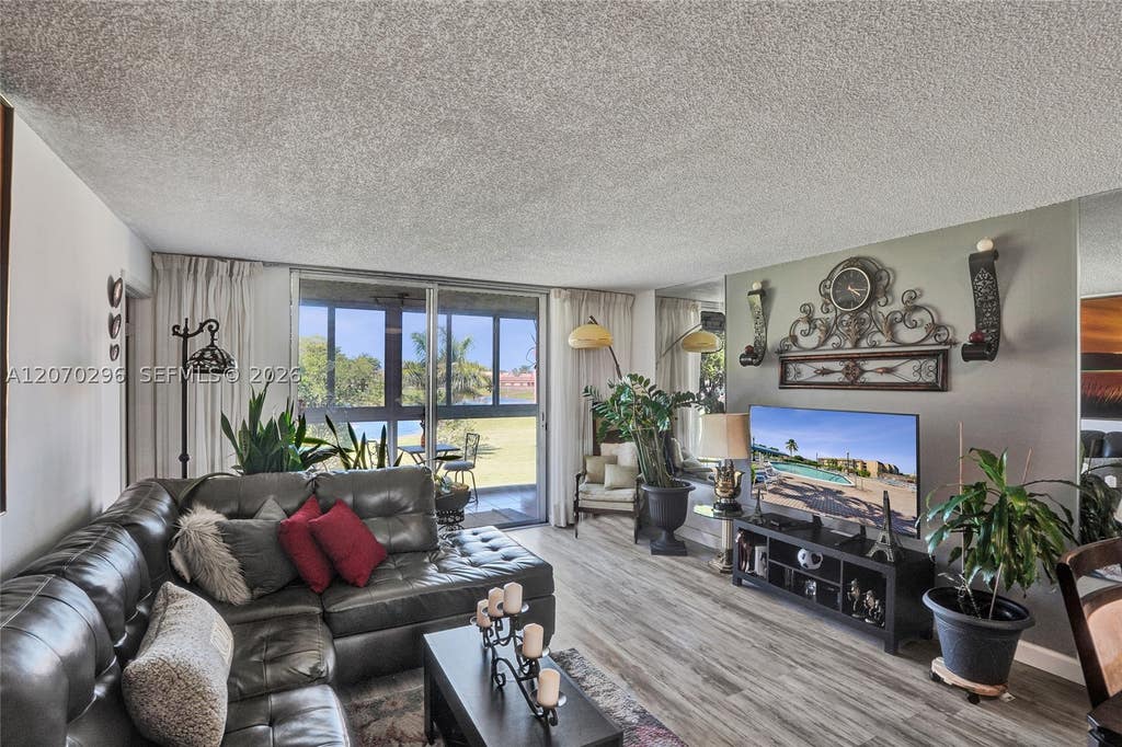 Photo of 9461 Sunrise Lakes Blvd #208, Sunrise, FL 33322 (MLS # A12070296)