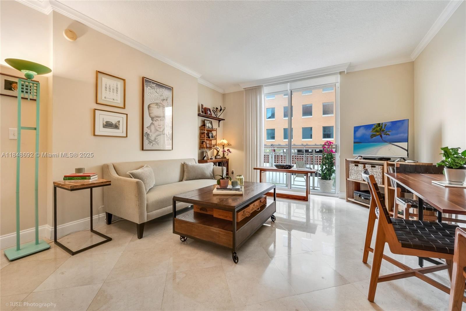 Beautiful 3-bedroom/2-bath (2BR + private den) condo residence in sought-after Coral Gables. This well-designed split floor plan features elegant marble flooring throughout, an open kitchen with granite countertops, contemporary wood cabinetry, and stainless steel appliances. The private den offers flexibility as a third bedroom, home office, or guest space. Enjoy the convenience of an in-unit washer and dryer, walk-in closets, plus two tandem parking spaces directly near the elevator. Ideally nestled in the heart of Coral Gables, just steps from fine dining, upscale shopping, and cultural venues. Minorca offers 24/7 security, beautiful pool, hot tub, gym, and first-floor retail including café, salon, medical, and professional services. Per developer condo docs, the 11 line is 1,337 sq ft.
