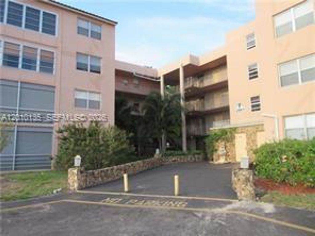 Photo of 2861 Somerset Dr #107, Lauderdale Lakes, FL 33311 (MLS # A12010135)