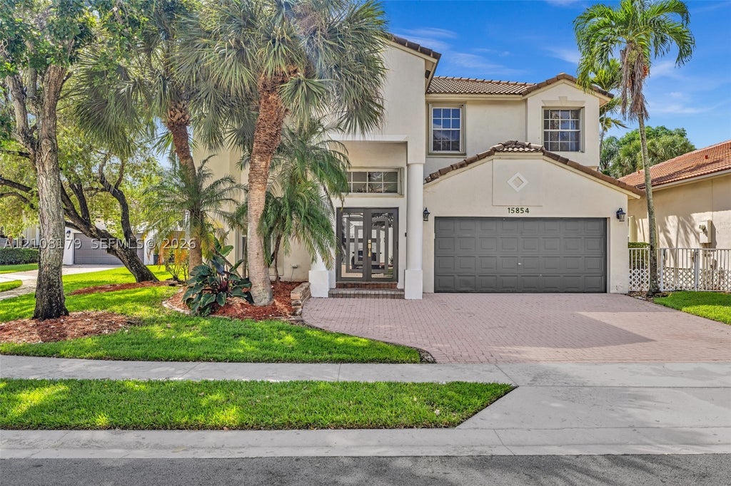 Photo of 15854 SW 14th Ct, Pembroke Pines, FL 33027 (MLS # A12108179)