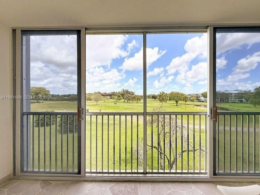 Beautifully renovated 2-2 unit in a vibrant Resort Style  55+community Century Village, bright and spacious modern comfort style unit overlooking exceptional and serene golf course views ,ready to Move In. Features a modern open kitchen with brand new Stainless Steel Appliances including stack washer-dryer. Bathrooms also exquisitely upgraded. Ceramic flooring in social areas and laminated wood in bedrooms. Freshly painted. Amenities includes among others a truly unique state of the art Club house, various Olympic Swimming Pools, Fitness Center, Tennis Courts and more. Maintenance includes Basic Cable, basic Internet, water, trash exterior. Unbeatable location. Easy access to I-75, courtesy bus transportation to proximities, close to shopping, dining, hospitals, etc. Do not miss this one.