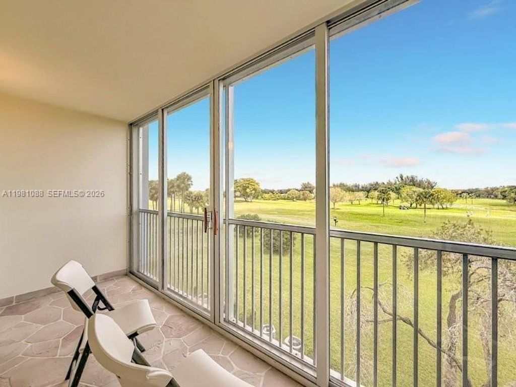 Photo of 12701 SW 13th St #310F, Pembroke Pines, FL 33027 (MLS # A11981088)