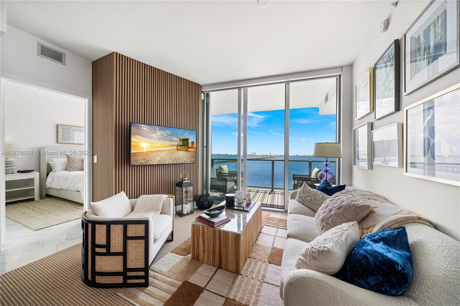 Experience the ultimate in luxury living at Biscayne Beach in this designer-furnished 2 bedroom +den, 3 full bath residence with unobstructed views of the Ocean and Bay from every room. The elegant interior design and furnishings in this residence are first class. This is absolutely the finest furnished condo in all of Edgewater. Your private elevator opens into the residence, Miele & Subzero appliances, floor-to-ceiling glass windows, 2 parking spots, gorgeous Porcelanosa floors throughout & exotic stone in the baths, plus an enormous master bedroom custom closet. Indulge in top-tier amenities at Biscayne Beach: A private beach club overlooking Biscayne Bay with day beds/lounges/cabanas, stunning fitness center, spa rooms, sauna, steam rooms, 2 pools, jacuzzi, 2 tennis courts, and more.