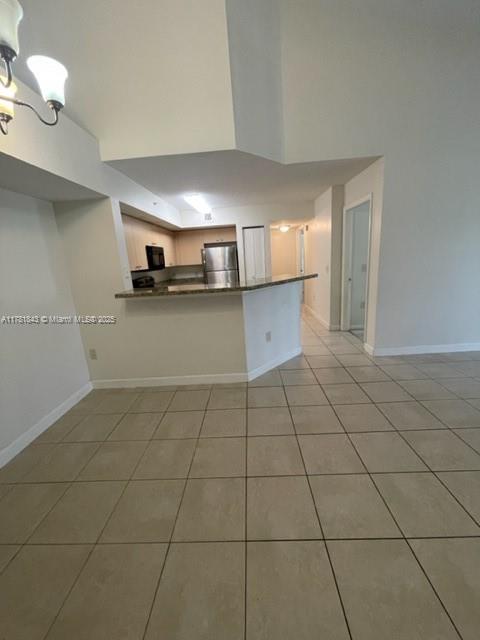 This third floor walk up condo has three bedrooms and two bathrooms. Tile throughout and carpet in all bedrooms. Full size washer and dryer. Open and covered balcony with sliding doors from family room. Community includes fitness center, play area, pool/hot tub, racquet ball, basketball and tennis courts. Near major roads, shopping, highways, restaurants, beaches, parks. airport and more.