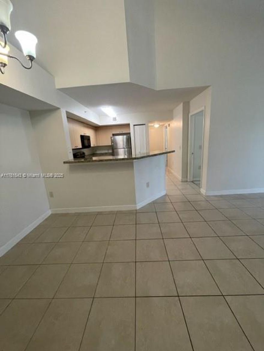 This third floor walk up condo has three bedrooms and two bathrooms. Tile throughout and carpet in all bedrooms. Full size washer and dryer. Open and covered balcony with sliding doors from family room. Community includes fitness center, play area, pool/hot tub, racquet ball, basketball and tennis courts. Near major roads, shopping, highways, restaurants, beaches, parks. airport and more.