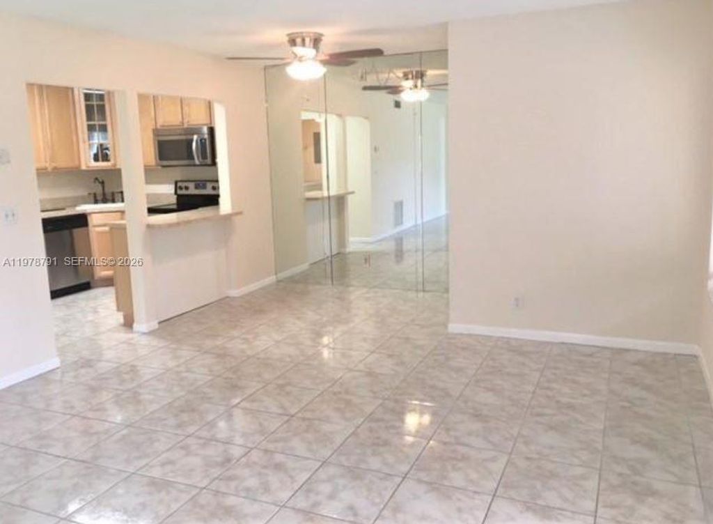 Photo of 5930 Whispering Pine #C1, Palm Beach, FL 33463 (MLS # A11978791)