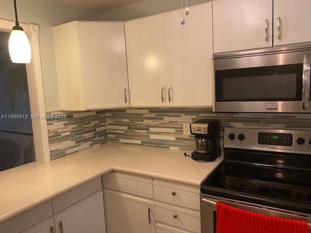 Photo of 5100 SW 64th Ave #202, Davie, FL 33314 (MLS # A11985012)