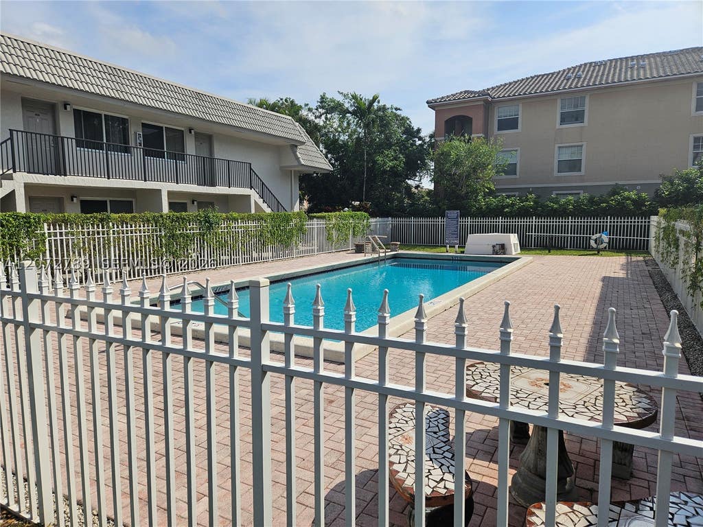 Photo of 3273 NW 102nd Ter #3273, Coral Springs, FL 33065 (MLS # A12072789)