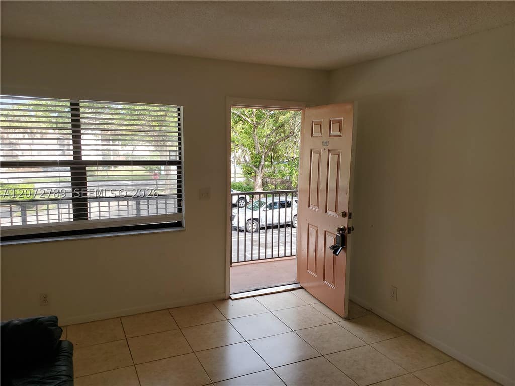 Photo of 3273 NW 102nd Ter #3273, Coral Springs, FL 33065 (MLS # A12072789)