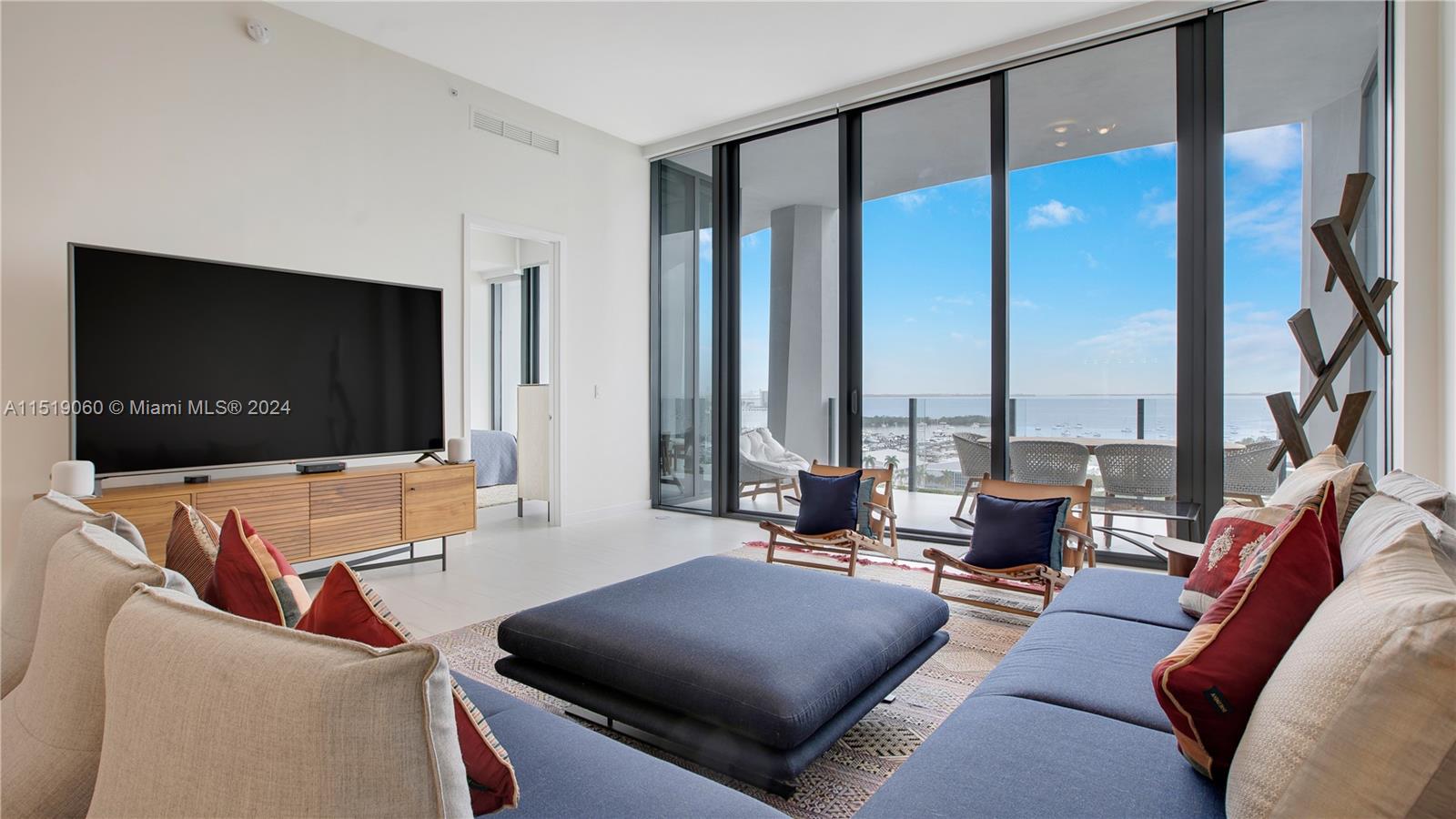 Welcome to One Park Grove, the crown jewel of Coconut Grove. Nestled on 5 acres, this residence offers an expansive 80,000 SQFT of lush green space & 50,000+ SQFT of luxurious amenities, meticulously crafted by the renowned architect Rem Koolhaas/OMA. 14C is adorned with 12-foot floor-to-ceiling glass doors & windows that frame the panoramic Biscayne Bay. Enjoy private oversized waterfront terraces, perfect for soaking in the picturesque surroundings. Exquisitely designed eat-in chef's kitchen features top-of-the-line Wolf & Subzero appliances. This residence comes complete with an assigned parking space, valet parking, storage unit, & a wine locker, ensuring both convenience & indulgence for its discerning residents. Experience the epitome of sophisticated living at One Park Grove.