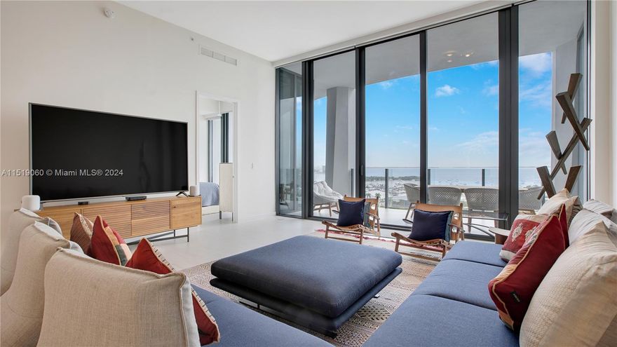 Welcome to One Park Grove, the crown jewel of Coconut Grove. Nestled on 5 acres, this residence offers an expansive 80,000 SQFT of lush green space & 50,000+ SQFT of luxurious amenities, meticulously crafted by the renowned architect Rem Koolhaas/OMA. 14C is adorned with 12-foot floor-to-ceiling glass doors & windows that frame the panoramic Biscayne Bay. Enjoy private oversized waterfront terraces, perfect for soaking in the picturesque surroundings. Exquisitely  designed eat-in chef's kitchen features top-of-the-line Wolf & Subzero appliances.  This residence comes complete with an assigned parking space, valet parking, storage unit, & a wine locker, ensuring both convenience & indulgence for its discerning residents. Experience the epitome of sophisticated living at One Park Grove.