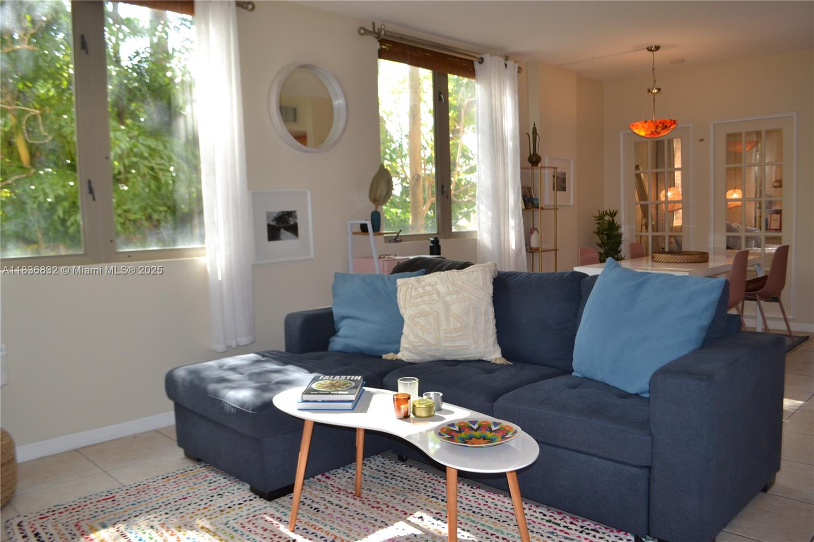 Looking for a furnished apartment close to University of Miami, Downtown or Brickell's Financial District? Look no further, run, don't walk and call for private showing today! Bright and airy furnished tree-top residence in highly sought after boutique building of the "vibey" enclave of Coconut Grove. New Sprouts, new Target and the new Coconut Grove Metrorail station are just steps away so no vehicle needed to live/work/study/play in Miami. This freshly decorated open concept, corner unit with neutral tile throughout, inside laundry, walk-in closet, impact windows, SS appliance has it all. Included is also secured garage parking, secured entrance and fitness room. What more could you need but to call it your home now!