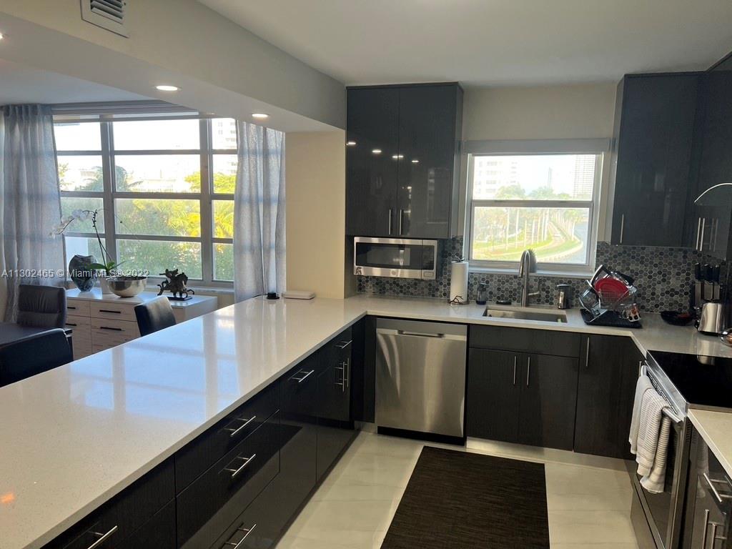 COMMODORE PLAZA CONDO - Residential