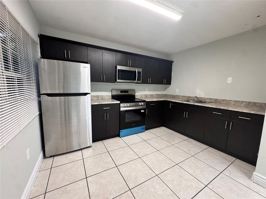 Photo of 5931 Wiley St #5931, Hollywood, FL 33023 (MLS # A12022625)
