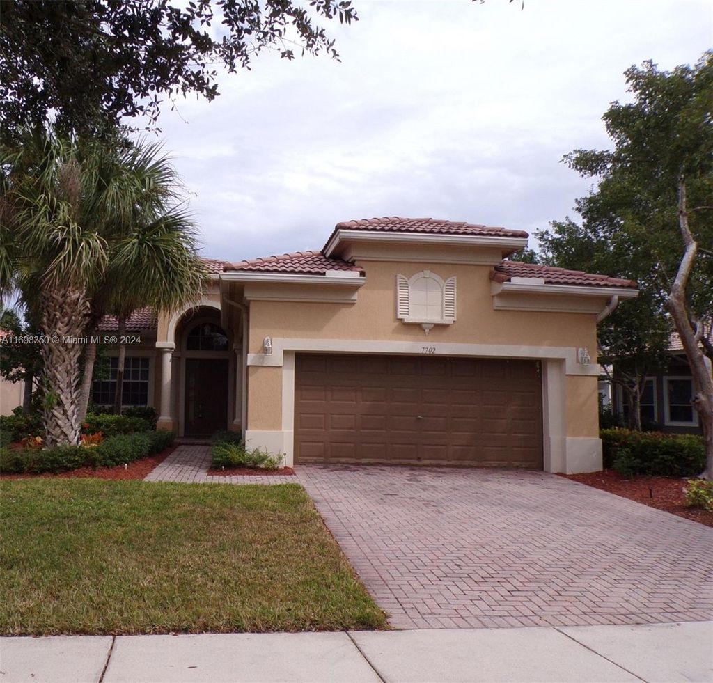 Photo of 7702 NW 124th Ter #0, Parkland, FL 33076 (MLS # A11698350)