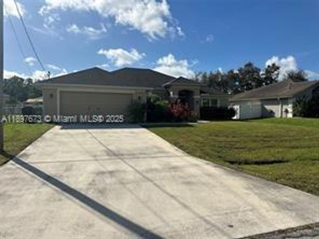 Photo of 5834 NW Gillespie Ave, Port St Lucie, FL 34986 (MLS # A11897673)