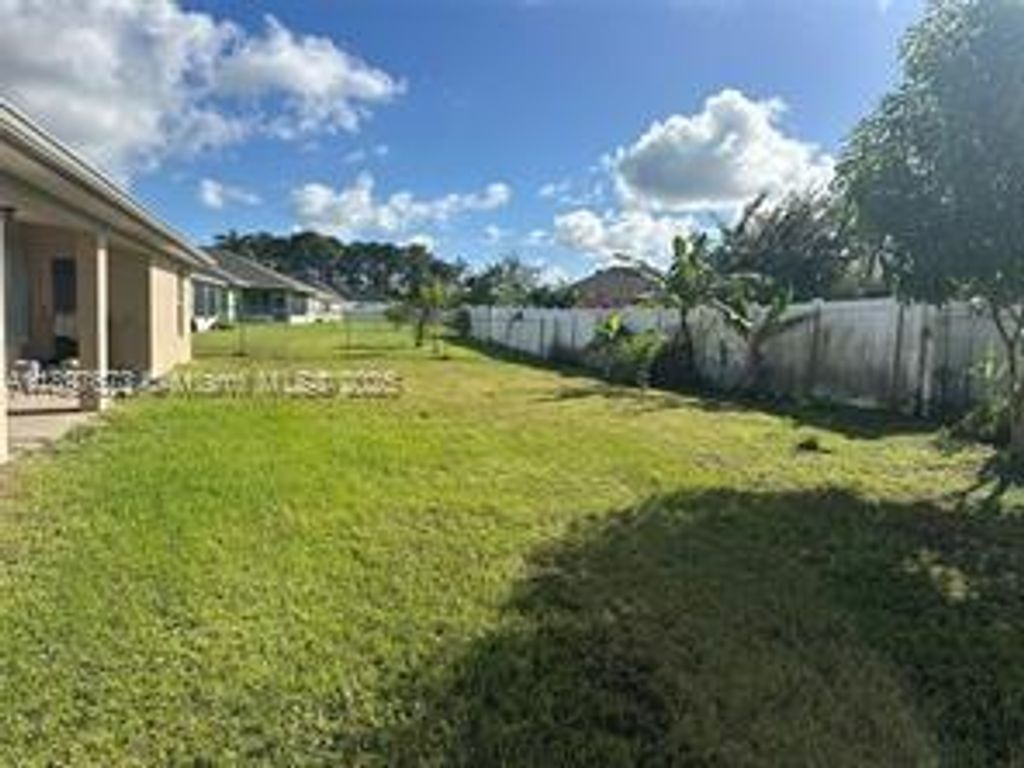 Photo of 5834 NW Gillespie Ave, Port St Lucie, FL 34986 (MLS # A11897673)
