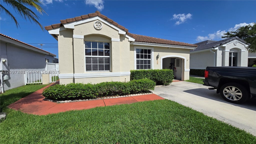 Photo of 5058 SW 148th Ter #5058, Davie, FL 33331 (MLS # A12097283)