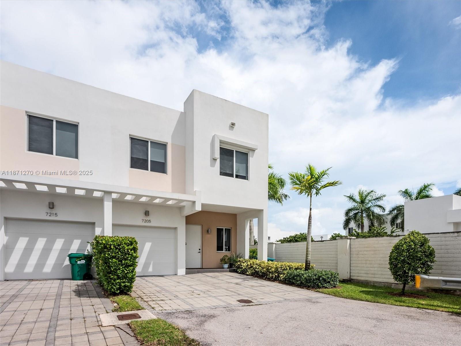 Modern corner townhouse in gated Neovita at Doral! Features 4 bed., 3.5 baths, spacious layout, ceramic & wood-style floors, quartz kitchen, impact windows, blackout blinds. 2 bedrooms with en-suite baths, plus shared bath upstairs. Full-size washer/dryer. Fits 5 cars. Corner lot offers privacy & extra outdoor space. Resort-style amenities: pool, gym, clubhouse & more. Prime Doral location!One or more photo(s) was virtually staged