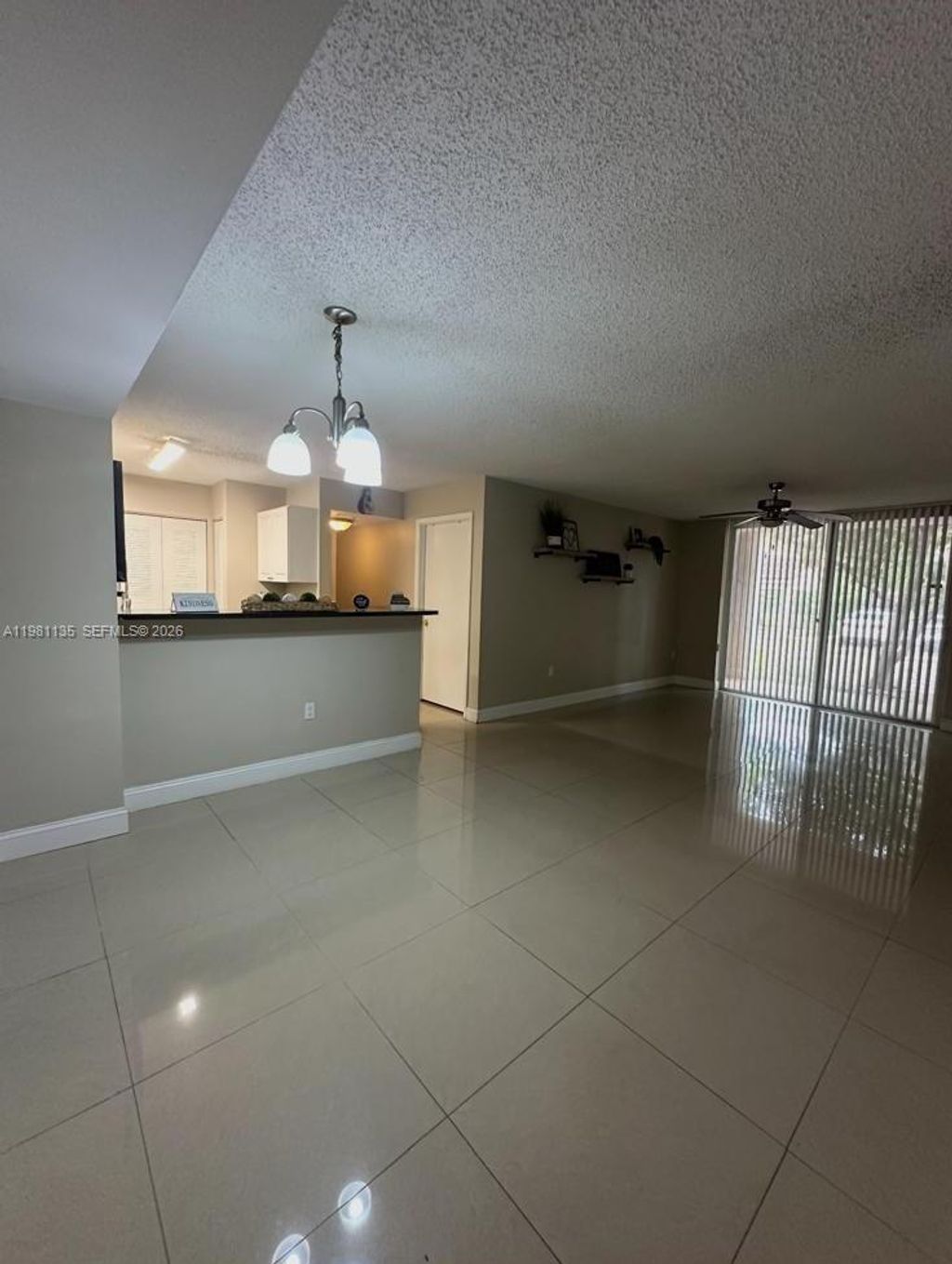Photo of 12124 Saint Andrews Pl #101, Miramar, FL 33025 (MLS # A11981135)