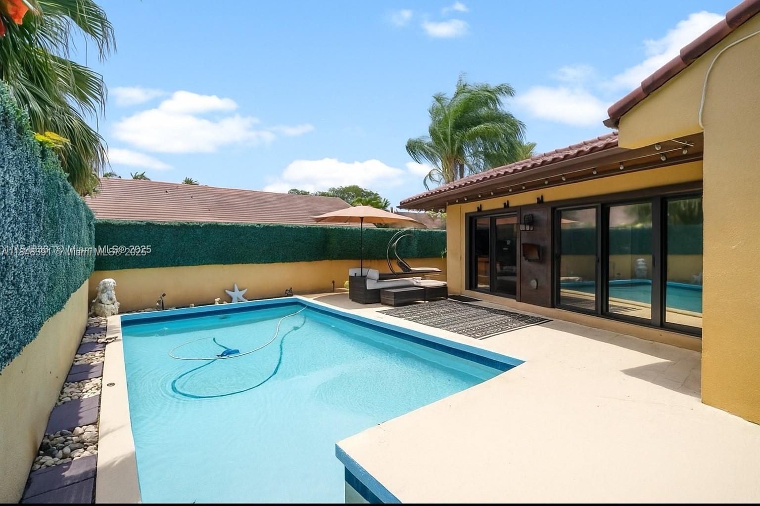 Stunning home for sale in the highly desired gated community of California Club homes. This home features 3 bedrooms and 2 bathrooms. This is one of the rare homes with its own pool, impact windows and a 2 car garage. Lots of natural lighting inside, vaulted ceilings and plenty of space inside and out. Call today for a private tour.