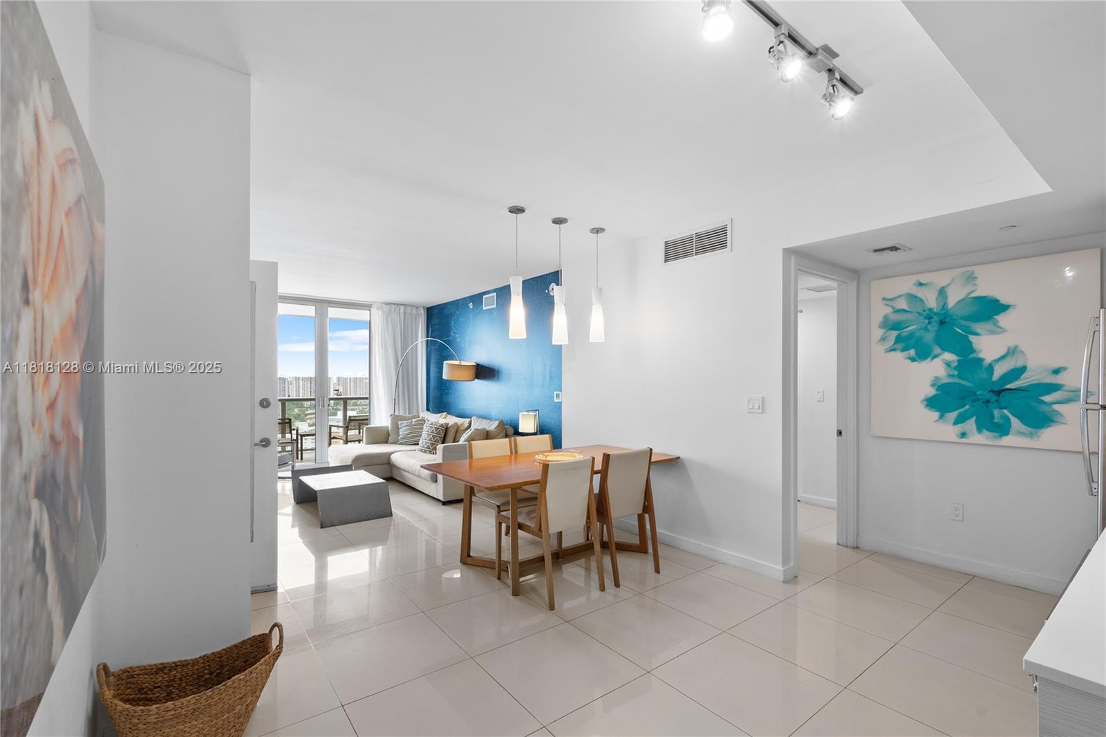 LINE 05 BEST VIEWS!!! PRICED TO SELL!! Upgraded turnkey 2-bed unit at Beachwalk Resort with spectacular south-facing views of the Intracoastal, ocean, and Sunny Isles skyline. Fully furnished, tile floors throughout, renovated master bathroom, and tiled balcony. Features 2 separate entrances: Side A (1/1 with kitchen and balcony) and Side B (studio with balcony), ideal for short-term rentals—no restrictions. Rent together or separately via Airbnb, VRBO, or Booking. Resort amenities include rooftop for owners, garage parking, beach shuttle, pool, gym, and waterfront restaurant.
Video: click VT in the Mlx