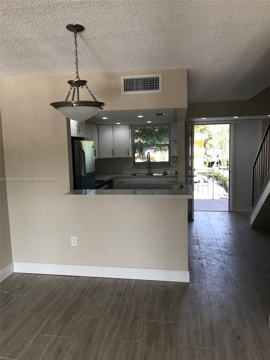 Beautiful, Modern and Spacious 2 story 1 bedroom 1 1/2 bath with 2 balconies, corner lot in The Beach Club. COMPLETELY UPDATED KITCHEN WITH QUARTZ AND NEW STAINLESS APPLIANCES , BATHROOMS, and LAUNDRY. TILED THROUGHOUT, NEW APPLIANCES, NEW BATHTUB, NEW AC Unit, NEW WASHING AND DRYING IN A LARGE LAUNDRY ROOM, NEW TANKLESS WATER HEATER, BUILT IN WALK IN CLOSET. CONTACT VIA PHONE, TEXT OR EMAIL TO SCHEDULE AN APPOINTMENT. 2 ASSIGNED PARKING SPACES, PLENTY OF VISITORS PARKING.