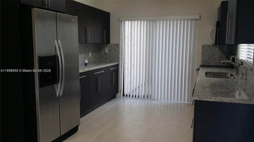 Photo of 192 Wimbledon Lake Dr #192, Plantation, FL 33324 (MLS # A11818350)