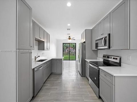 Photo of 141 W 16th St, Riviera Beach, FL 33404 (MLS # A11959982)