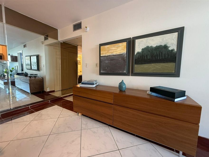 Beautifully unfurnished 1BR/1.5BA condo in Miami Beach. Spacious layout with ceramic floors, walk-in closet, and private balcony. Enjoy rooftop pool, parking, and secured building access. Steps from Publix, restaurants, beach, and public transit.