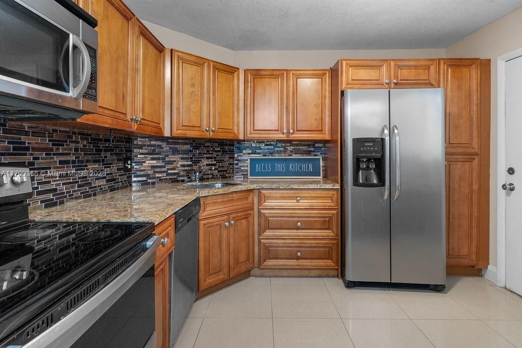 Photo of 3330 Spanish Moss Ter #109, Lauderhill, FL 33319 (MLS # A11709368)