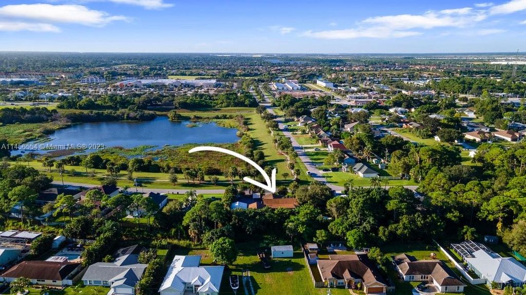 Photo of 1881 SW Oakwood Rd, Port Saint Lucie, FL 34953 (MLS # A11456554)