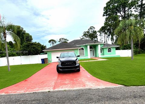 Tiny photo for 811 Jefferson Ave, Lehigh Acres, FL 33936 (MLS # A12027462)