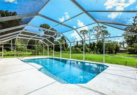 Tiny photo for 811 Jefferson Ave, Lehigh Acres, FL 33936 (MLS # A12027462)
