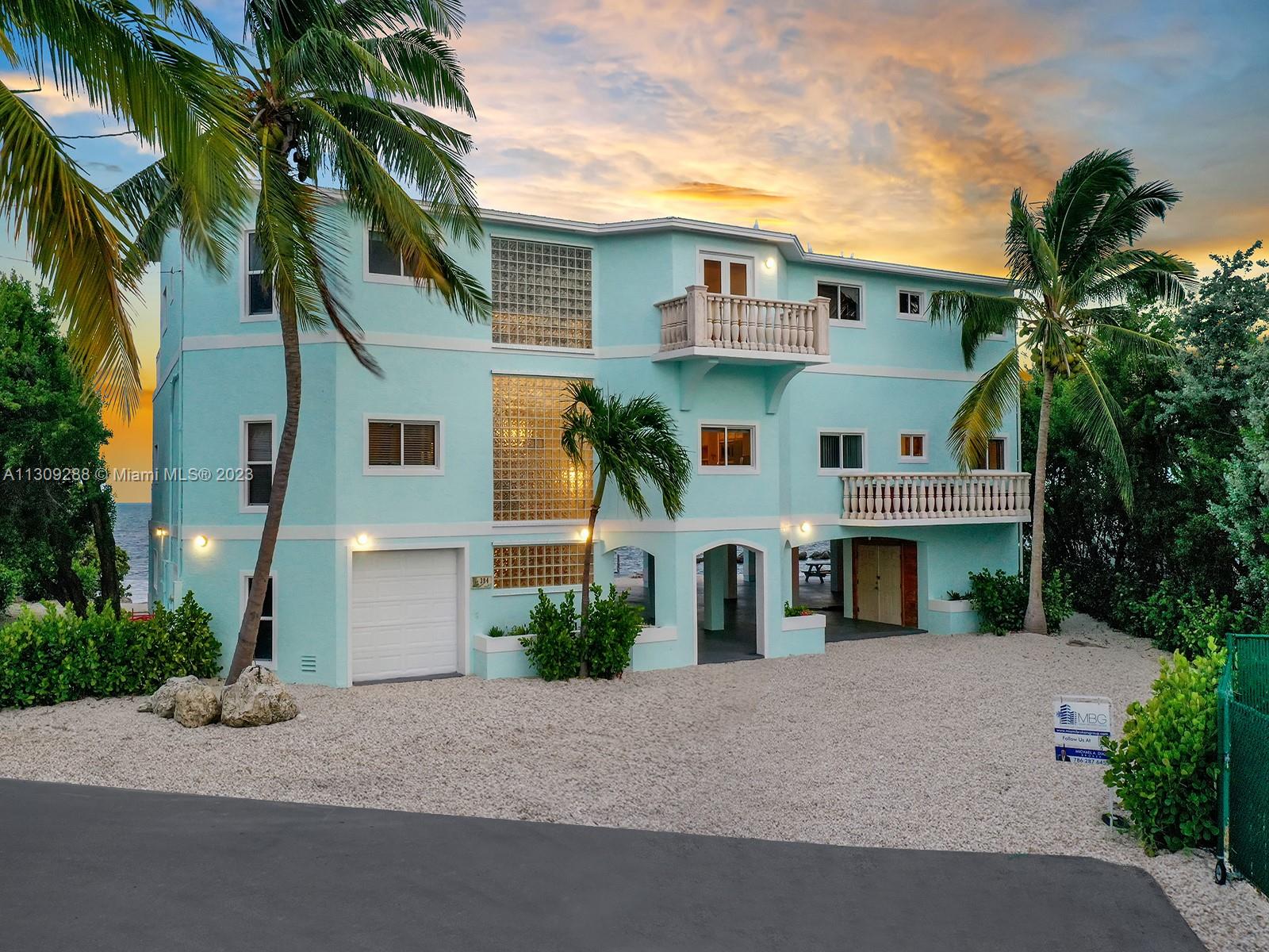 From the moment you arrive, you will be awe-struck by 24 ft soaring ceilings & unobstructed ocean views. An ideal family compound or vacation retreat, this 13K total sqft home has room for everything & everyone. Open concept plan w/many seating & entertaining areas, incl. large kitchen, dining, bar, & living/family room, all connecting to a wrap around balcony & deck with space for outdoor dining. Primary suite w/ocean-front balcony + en-suite bath & xl walk-in closets. 3rd floor loft w/separate entertaining areas + addt’l bedrooms & gym via adjacent catwalk overlooking the primary level & ocean views. Massive property w/60 ft concrete dock & beach, the ground level is a blank canvas ready for your finishing touch. SQFT info per public records.