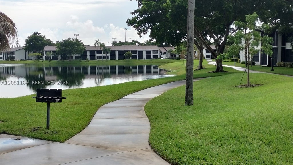 Photo of 212 Lake Pointe Dr #307, Oakland Park, FL 33309 (MLS # A12051186)