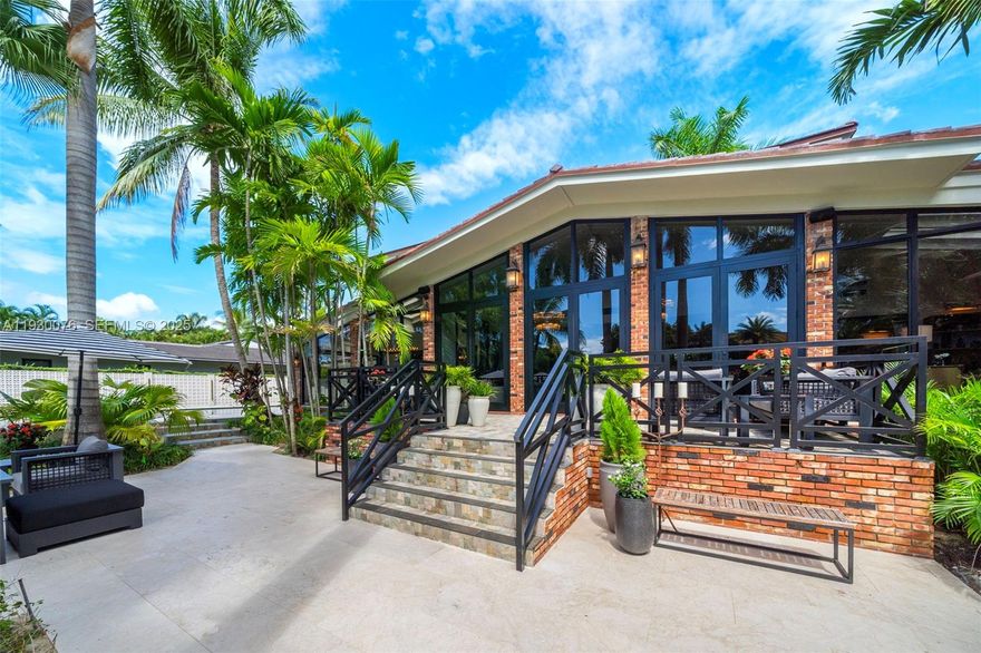 Discover unparalleled luxury and tropical elegance in this rare double lot 120ft waterfront estate with pool. Completely renovated in 2025, two-story home located in the prestigious, guard-gated community of Belle Meade Island. This estate features 6 spacious oversized en-suite bedrooms and 6.5 designer bathrooms, providing ample room for family, guests, and executive-level entertaining. Experience the feel of a brand-new home with high-end, contemporary finishes throughout. This Belle Meade Island masterpiece is a rare opportunity to acquire a fully turn-key, substantial estate in one of Miami's most sought-after and secure island enclaves. A true sanctuary ready for immediate, sophisticated living.