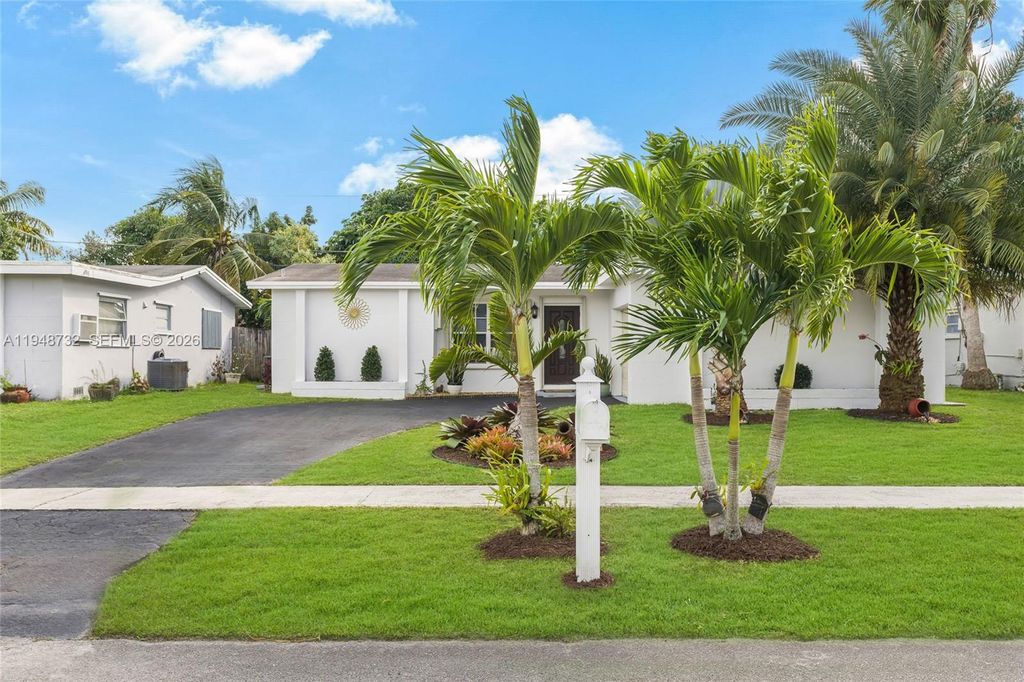 Photo of 8440 NW 28th Pl, Sunrise, FL 33322 (MLS # A11948732)