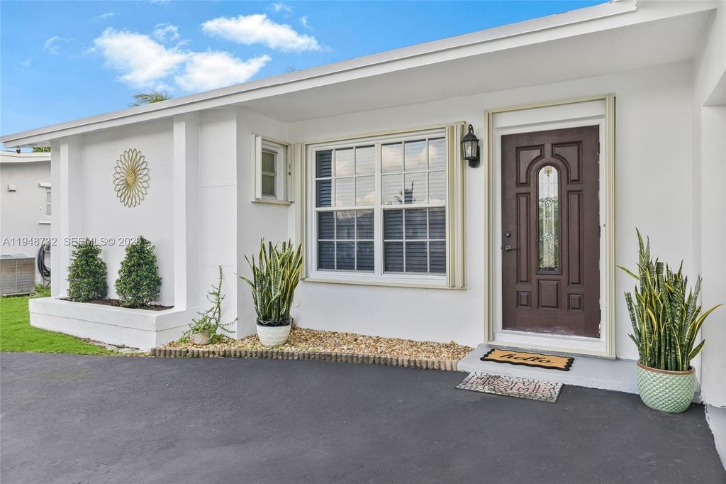 Photo of 8440 NW 28th Pl, Sunrise, FL 33322 (MLS # A11948732)