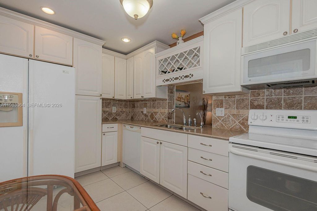 Photo of 4270 NW 40th St #201, Lauderdale Lakes, FL 33319 (MLS # A11983064)