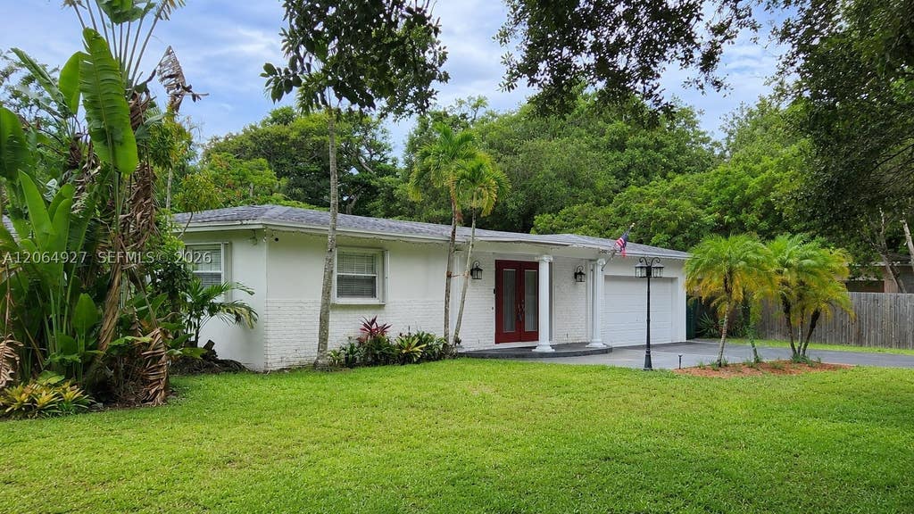 Photo of 4020 SW 2nd St, Plantation, FL 33317 (MLS # A12064927)