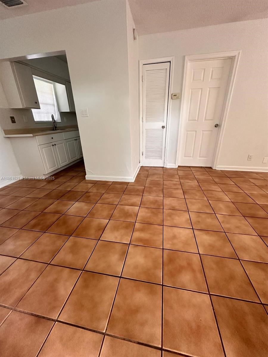 1 bedroom 1 bathroom apartment located on the first floor. Tile floors throughout, central A/C, water, landscaping and garbage included in rent. One assigned parking space. Conveniently located next to laundromat. Tenants must provide proof of income 3x rent. Fast approval, no association. Easy to show, vacant and on lockbox.