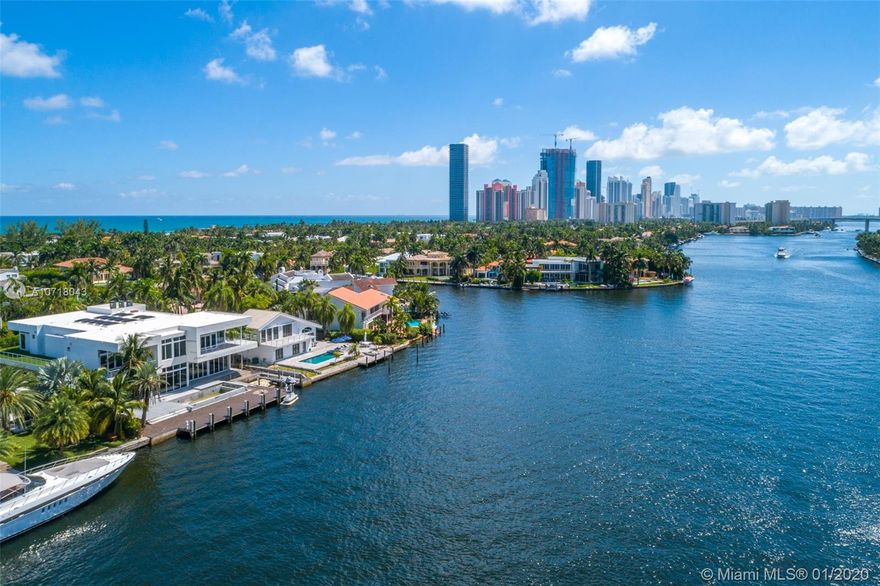 This fully renovated, turn-key intracoastal gem sits on 100 ft of prime water frontage, offers 4,751 sq ft under AC, four bedrooms + den, an open floor-plan, high ceilings, great natural light and high end finishes. The 12,600 sq ft lot includes a resort-style backyard and stunning panoramic views. One-of-a-kind opportunity to live in the premier Center Island and enjoy the unmatched amenities of the secure and exclusive neighborhood of Golden Beach. Amenities include private beach club, private police force, tennis courts/playgrounds, gym facility and many more.