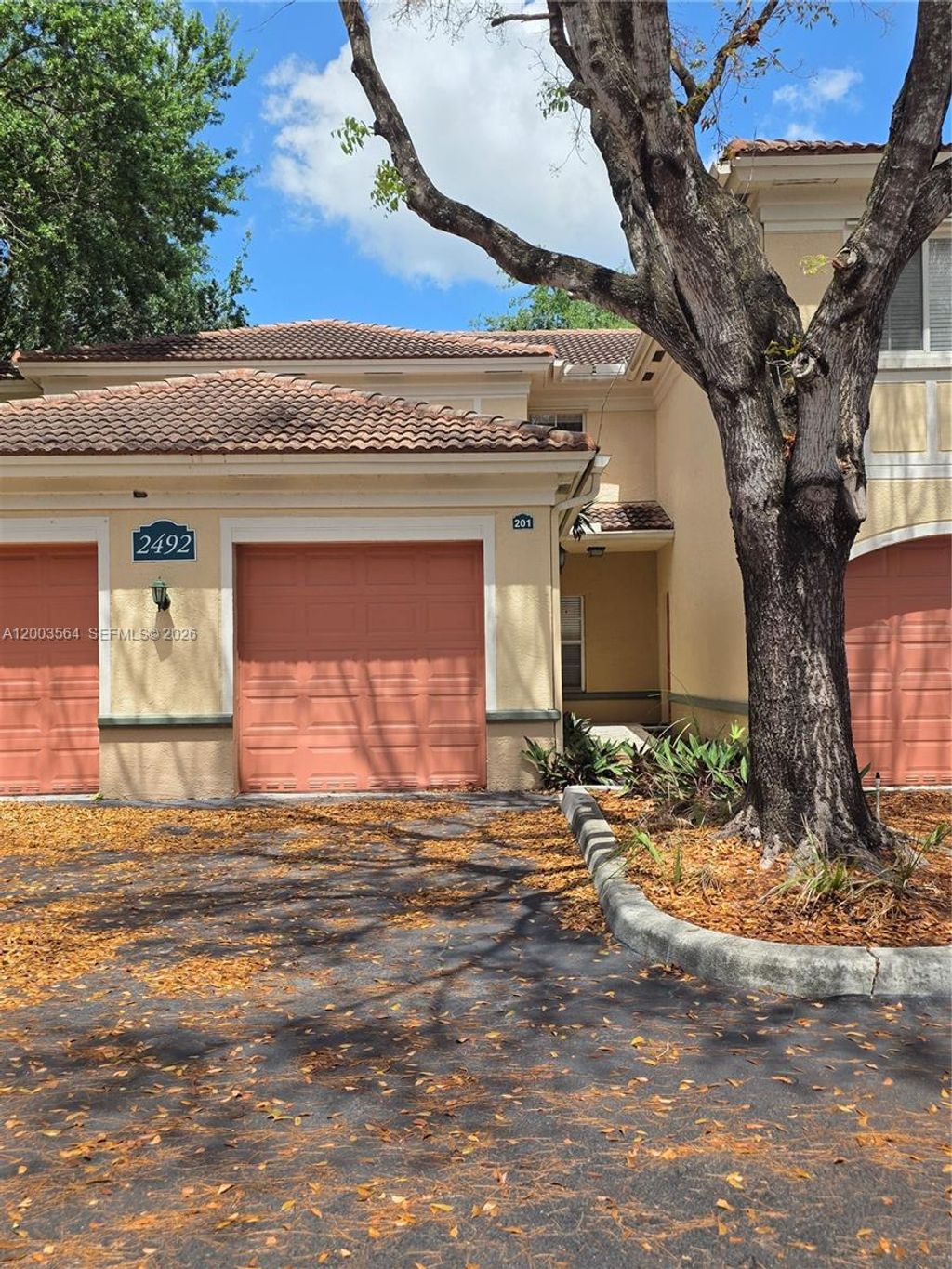 Photo of 2492 Centergate Dr #201, Miramar, FL 33025 (MLS # A12003564)