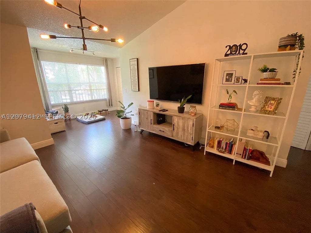 Photo of 13090 Vista Isles Dr #125, Sunrise, FL 33325 (MLS # A12079412)